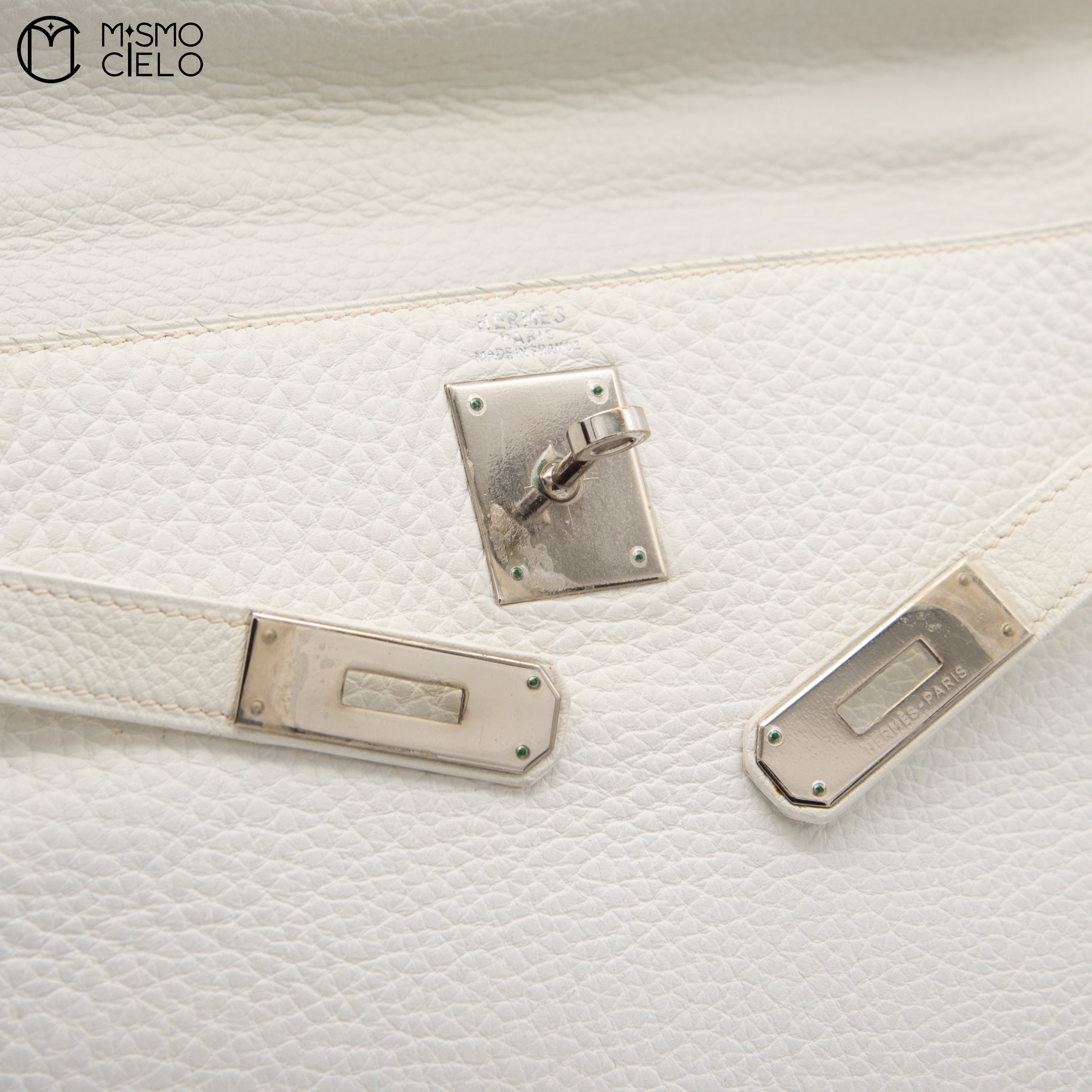 Authenticated Kelly 32 Clemence White Square F Engraved